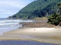 Striking Woman Enjoys Neptune Beach Near Yachats Oregon Royalty Free Stock Photo