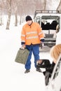 Woman broken car man gas can snow Royalty Free Stock Photo