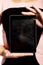 Woman with broken tablet Royalty Free Stock Photo