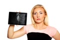 Woman with broken tablet Royalty Free Stock Photo