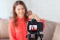 Woman with bronzer and camera recording video Royalty Free Stock Photo