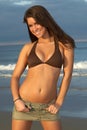 Woman in Brown Bikini Top with Thumbs in Belt Loops