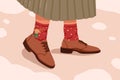 Woman in brown trendy oxford, brogue or derby shoes and cute socks. Female legs in stylish comfortable elegant leather