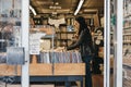 Woman browse vinyl records at a store in Notting Hill, London.