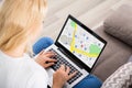 Woman Browsing GPS Map On Laptop Royalty Free Stock Photo