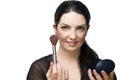 Woman with brush for blush and mirror Royalty Free Stock Photo