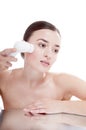 Woman with brush for deep cleansing facial. Royalty Free Stock Photo