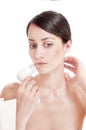 Woman with brush for deep cleansing facial. Royalty Free Stock Photo