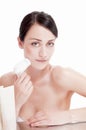 Woman with brush for deep cleansing facial. Royalty Free Stock Photo