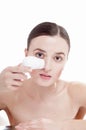 Woman with brush for deep cleansing facial. Royalty Free Stock Photo