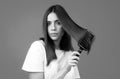 Woman Brushing Hair With Comb. Beautiful Girl Combing Long Hair With Hairbrush.