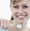 Woman brushing her teeth