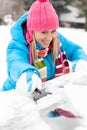 Woman brushing snow from car windscreen winter Royalty Free Stock Photo