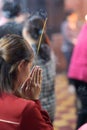 A woman in a Buddhist temple. Royalty Free Stock Photo