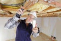 Woman builder architect shows thumb up