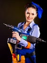 Woman builder with construction tools. Royalty Free Stock Photo