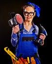 Woman builder with construction tools. Royalty Free Stock Photo