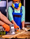 Woman builder with special tool Royalty Free Stock Photo