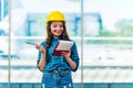 The woman builder taking notes at construction site Royalty Free Stock Photo
