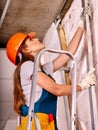 Woman in builder uniform