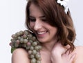 Woman with bunch of grapesand Royalty Free Stock Photo