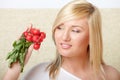 Woman with a bunch of radishes Royalty Free Stock Photo