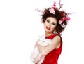 Woman with a bunny, eggs and flowers spring easter concept Royalty Free Stock Photo