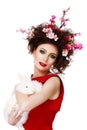 Woman with a bunny, eggs and flowers spring easter concept Royalty Free Stock Photo
