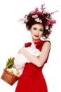 Woman with a bunny, eggs and flowers spring easter concept Royalty Free Stock Photo