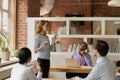 Female coach talk into microphone for audience during educational seminar Royalty Free Stock Photo