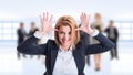 Woman business manager acting funny and childish Royalty Free Stock Photo