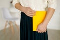 Woman businessman holding yellow notepad Royalty Free Stock Photo