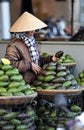 A woman in busy market in Vietnam Royalty Free Stock Photo