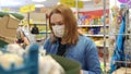 Woman Buyer wearing a protective mask.