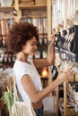 Woman Buying Cereals And Grains In Sustainable Plastic Free Grocery Store Royalty Free Stock Photo