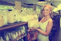 Woman buying cereals in grocery store Royalty Free Stock Photo