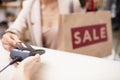 Woman Buying Clothes on Sale in Boutique Royalty Free Stock Photo