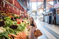 Woman buying food in the market