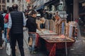 Woman buying jewellery on a street in Brussels, Belgium.