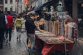 Woman buying jewellery on a street in Brussels, Belgium