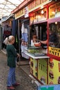 Woman buying a kebap in Skopje, Macedonia