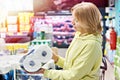 Woman buying kitchen paper towel Royalty Free Stock Photo