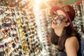 Woman buying sunglasses Royalty Free Stock Photo