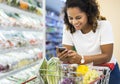 Woman buying vegetables at the supermarket