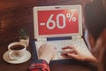 Woman buys online using laptop. Online shopping. Sale, seasonal discounts. Black Friday concept Royalty Free Stock Photo