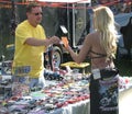 Woman purchasing some items from a vendor