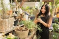 Woman in cactus garden with happy face Royalty Free Stock Photo