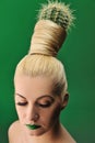 Woman with cactus in her hair Royalty Free Stock Photo