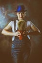 Woman with a cactus in her hand. The thorny plant is the symbol of the year. Long dangerous needles. Flower pot Royalty Free Stock Photo