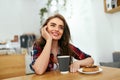 Woman In Cafe Drinking Coffee Royalty Free Stock Photo